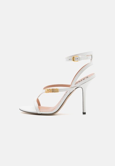 MOSCHINO DONNA - Kõrge kontsaga sandaalid - bianco