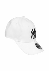 White baseball cap with black "NY" logo embroidery and a curved brim, featuring a silver "9Forty" sticker on the brim.