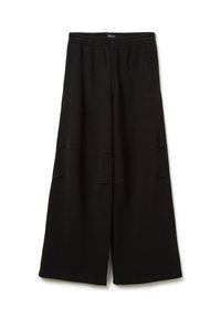 Zwarte wijde sweatpants gemaakt van zachte stof. Voorzien van een elastische tailleband en zijzakken. Subtiele branding bij de tailleband.