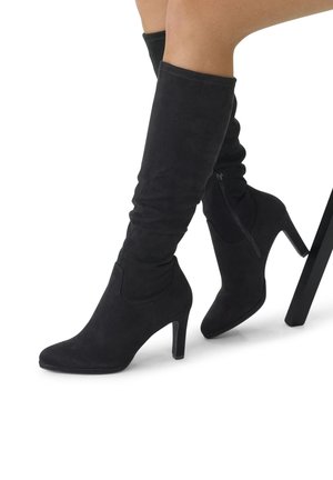 Black suede knee-high boots with a sleek design, pointed toe, and high heel; features a side zipper for easy wear.