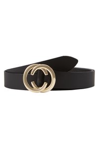 Black leather belt featuring a gold double C logo buckle. The strap is smooth with a tapered end, emphasizing a minimalist design.