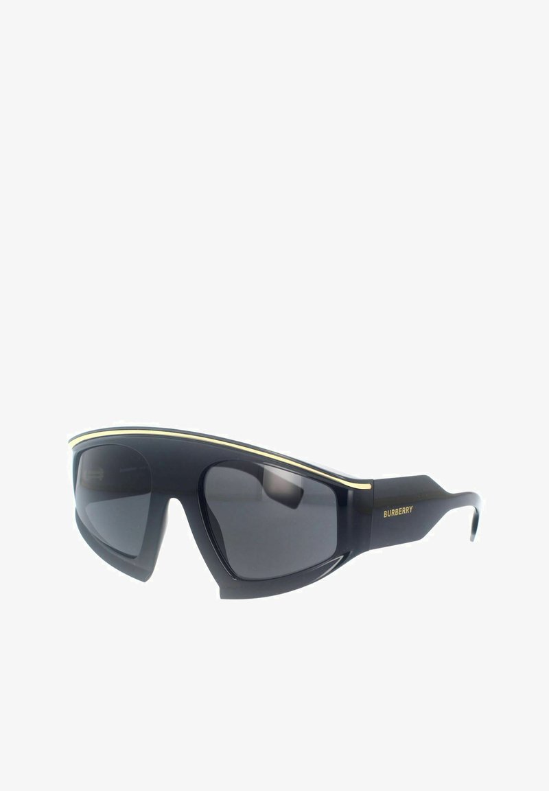 Occhiali da sole neri con un design elegante e curvo, rifinitura dorata lungo il bordo superiore e finitura opaca sulle montature. Logo Burberry di lato.