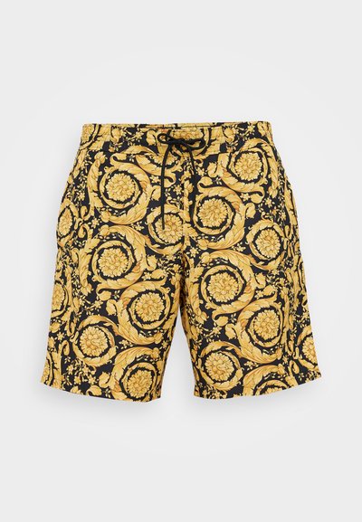 Svarta badshorts med ett gult blommönster och svängande mönster, elastisk midja och dragsko för justerbarhet.