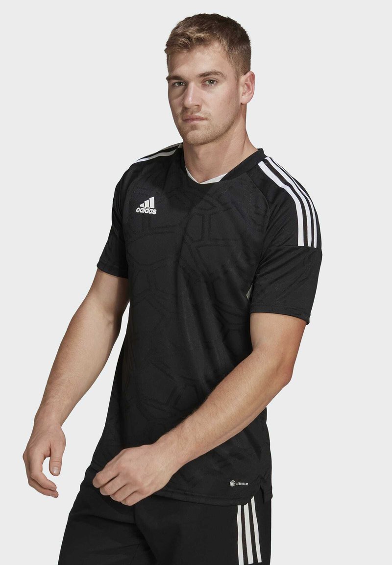 Black short-sleeve athletic shirt with a geometric pattern, white Adidas logo, and three white stripes on the shoulders.