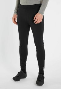 Pantaloni sportivi neri realizzati in materiale elasticizzato, con una vestibilità slim, vita elastica e dettaglio con zip sulla gamba inferiore.