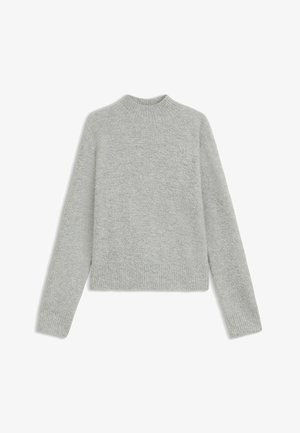 Maglione lavorato a maglia grigio chiaro con collo rotondo alto, maniche lunghe e orlo a costine. Morbido al tatto e con una vestibilità leggermente ampia.