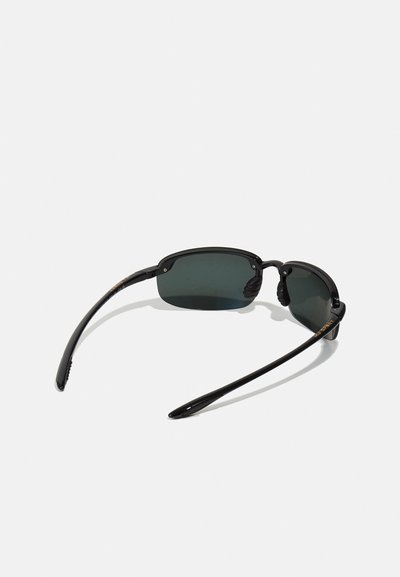 Black sunglasses with rectangular lenses, green-tinted. Slim black frames with detailed accents on the arms. Smooth texture, sporty design.