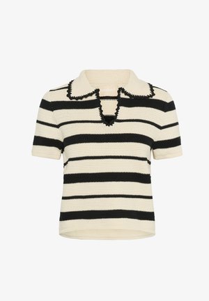 Neulepaita, jossa on musta ja kerma valkoisia vaakasuoria raitoja, lyhyet hihat, lovellinen kaulus frilla-reunoilla ja väljä leikkaus.