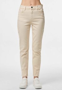 Beežid kõrge vöökohaga teksad, kitsas lõige, viis taskut, ees lukk ja nööbi sulguri ning pehme denimitekstuur.