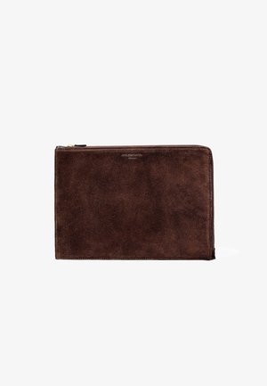 Dark brown suede rectangular pouch with top zipper and subtle branding near the top center.