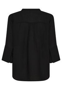 Svart långärmad skjorta med krage, knappade ärmslut och en texturerad, ribbad mönster. Bakifrån syns en avslappnad passform.
