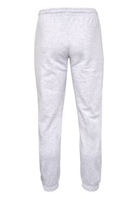 Graue Baumwoll-Sweatpants mit lockerer Passform, elastischem Bund und Bündchen, glatter Textur und ohne sichtbare Taschen oder Muster.