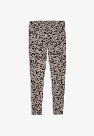 Legíny s béžovým základem a černým abstraktním zvířecím potiskem, s malým bílým logem Puma na horní části stehna.