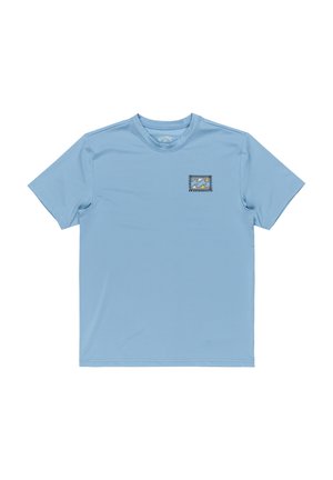 Light blue short-sleeve t-shirt in synthetic fabric, featuring a small wave graphic on a square patch at the chest. Smooth texture.