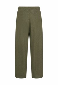Pantalons larges verts en matériau doux avec une finition texturée. Dotés d'une taille élastique et sans poches ni éléments métalliques visibles.