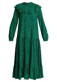 Groene jurk met een gerimpelde halslijn, lange mouwen en een geplooide rok met een zwart gevlekt patroon op een gladde stof.