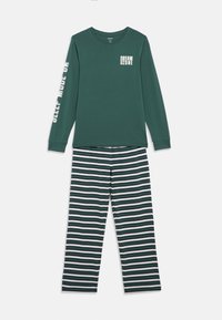 Long-sleeve green top with "DREAM ZONE" text and striped green, white, and black pajama pants set on white background.