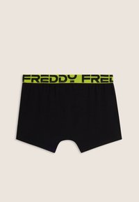 Boxer neri in cotone con una fascia larga verde neon con la scritta "FREDDY" ripetuta.