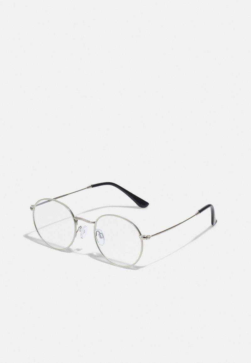 Ochelari de metal rotunzi cu un cadru subțire din argint, lentile clare și brațe negre cu vârfuri din cauciuc pentru confort. Design minimalist.