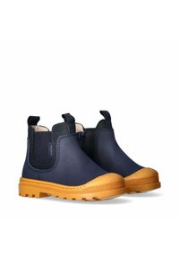 Stivali alla caviglia blu navy con pannelli laterali elasticizzati e linguette di trazione, caratterizzati da suole in gomma texturizzata color tan e punte per una maggiore aderenza e durata.
