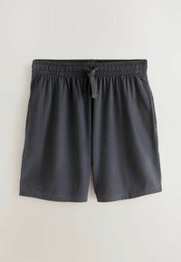 Shorts à taille élastique gris foncé avec cordon de serrage, poches latérales et coupe décontractée sur un fond clair.