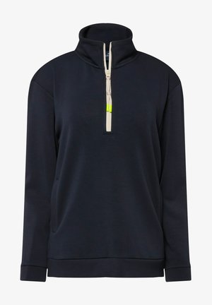Mørkeblå halv-zip pullover sweatshirt lavet af blødt stof. Har en høj krave, kontrastfarvet lynlås og sidelommer. Glat tekstur.