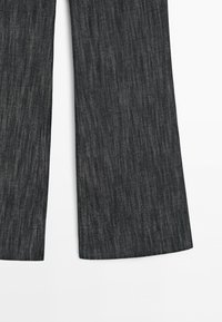 Dark gray denim jeans with a straight leg cut shown from the lower thigh to the hem on a white background.