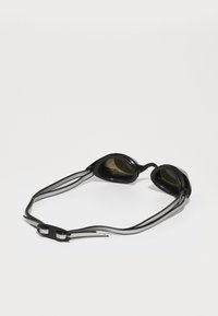 Black swimming goggles with dark lenses, soft rubberized frames, and dual elastic straps for secure fit. No visible patterns or accents.