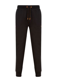 Pantalon de survêtement noir effilé avec cordons orange à pointe et poignets côtelés, doté de poches latérales sur fond blanc.