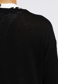 Kaffe Chaqueta de punto - black