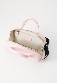 Tommy Jeans AMERICAN COOL TRUNK - Handtas - pink