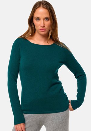 Pull à manches longues en teal avec un large col, fabriqué en matière tricotée douce. Design ajusté avec des poignets côtelés et une texture lisse.