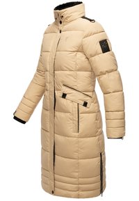 Beige puffer coat with a high collar, padded design, zippered pockets, and black accents on shoulders and cuffs. Features a logo patch.