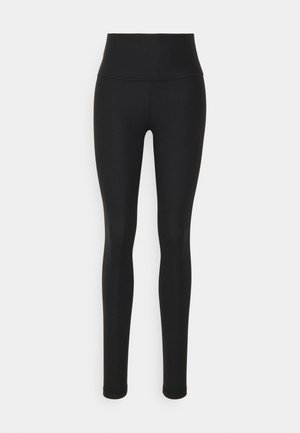 Sorte højtaljede leggings lavet af ribbet stof med en glat tekstur, der har et tætsiddende design og ankel længde.