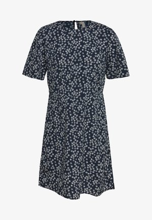 Marineblaues Kleid mit weißem Blumenmuster, kurzen Ärmeln, rundem Ausschnitt und einem Schlüsselloch-Detail auf der Rückseite. Der Stoff wirkt weich und glatt.