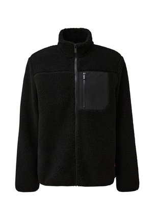 Giacca in pile nera con colletto alto, chiusura con zip e una tasca con zip nera a contrasto sul petto. Morbida al tatto.