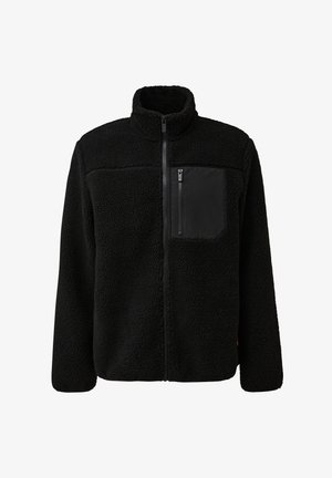 Giacca in pile nera con colletto alto, chiusura con zip e una tasca con zip nera a contrasto sul petto. Morbida al tatto.