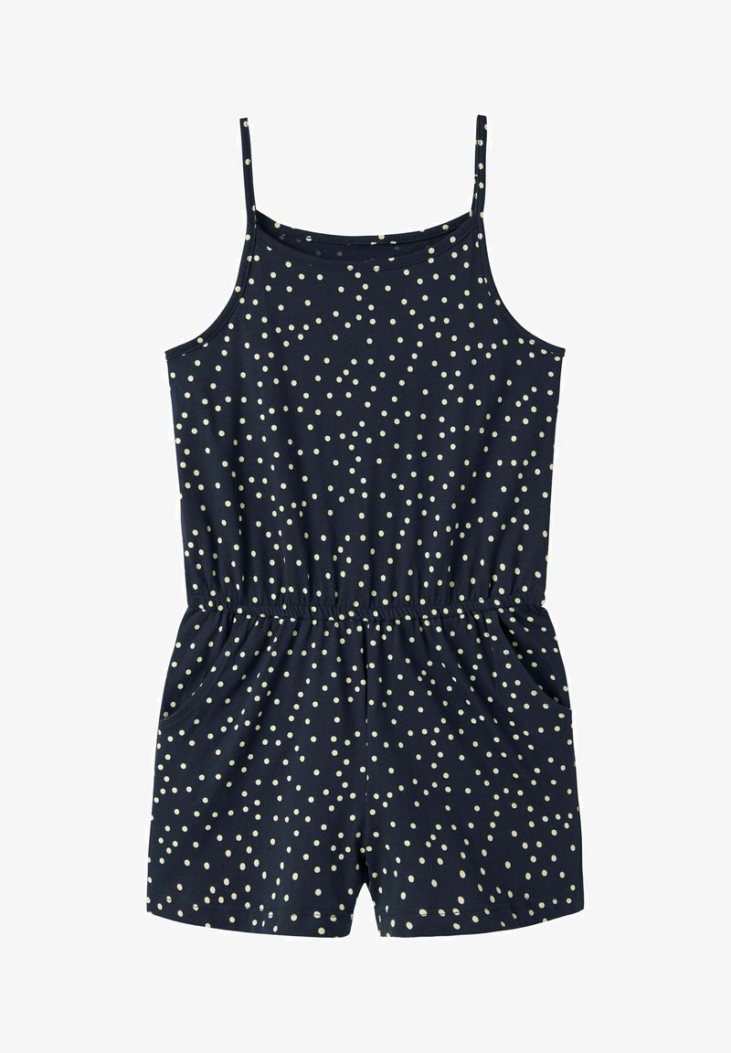 Granatowy kombinezon bez rękawów w białe kropki, z elastyczną talią i bocznymi kieszeniami.