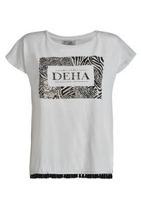 Hvid kortærmet T-shirt med en sort-hvid zebra-print grafik og teksten "DEHA" samt frynser i kanten.