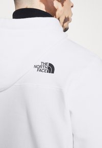 The North Face Mikina s kapucí - white