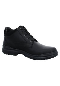 Black leather ankle boots with a textured surface, rounded toe, lace-up design, and a sturdy rubber sole for grip and support.