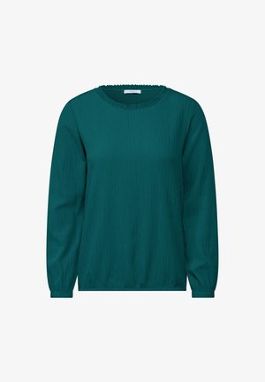 Teal långärmad blus i en texturerad tyg, rund halsringning och rynkade detaljer vid halsen och ärmsluten för en avslappnad passform.
