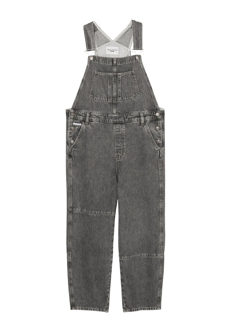 Denim overalls in faded grey with adjustable straps, front pocket, and side button closures. Features a relaxed fit and patchwork detailing.