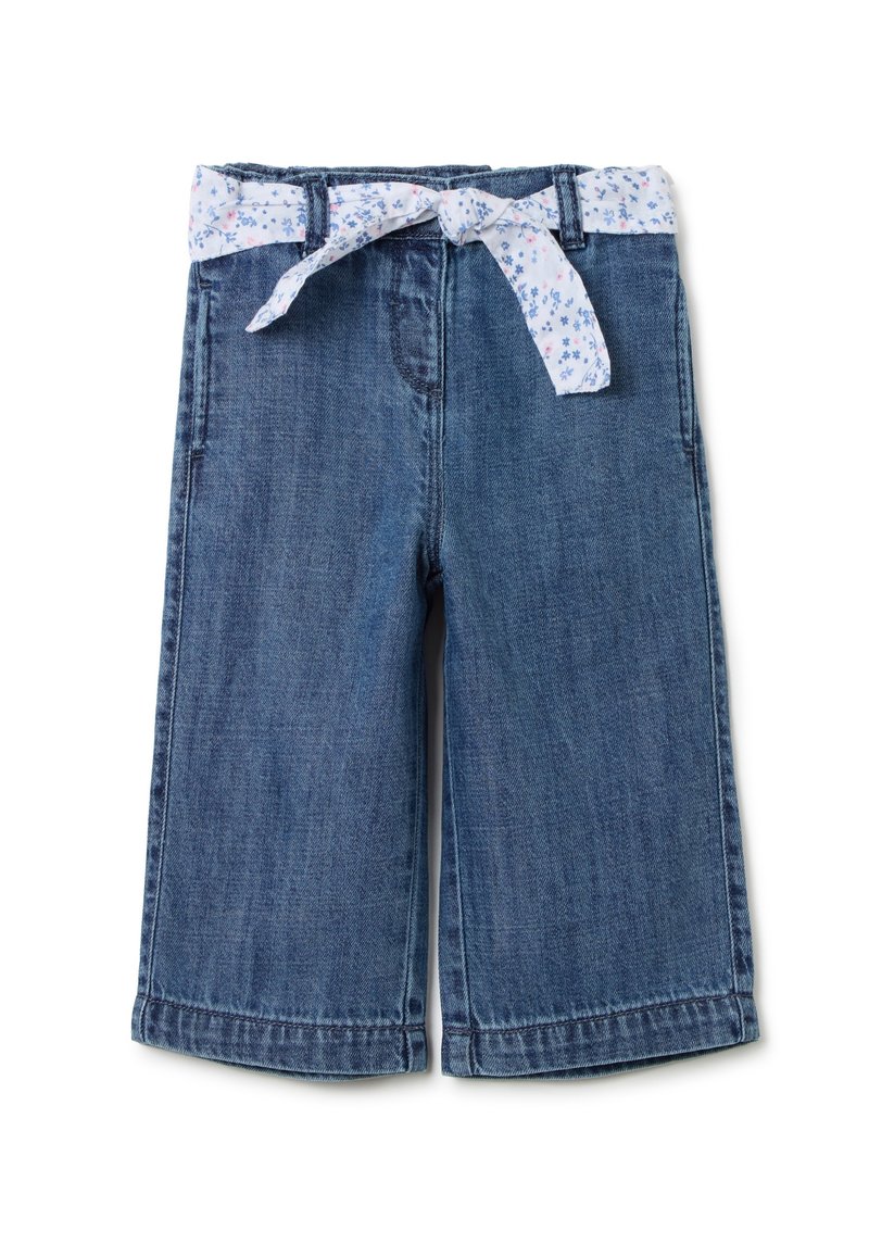 Culottes de mezclilla con una cinturilla que presenta un lazo con un patrón floral blanco. Tela azul oscura, corte holgado, con costuras y dobladillos visibles.