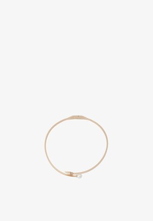 Collier ras de cou en métal au design circulaire lisse, avec un accent pointu et un petit détail en perle ronde. Couleur or clair.