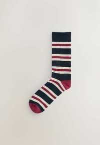 Navy blue sock featuring horizontal stripes in white and burgundy, with a solid burgundy toe and cuff. Made of a soft, textured material.