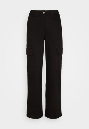 Jeans bootcut con cuciture | | Jeans Donna