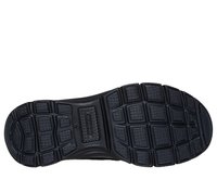 Semelle de chaussure en caoutchouc noir présentant une surface texturée et décorée d'indentations hexagonales et rectangulaires pour l'adhérence et la traction.