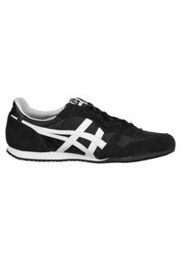 Black athletic shoe featuring a suede and fabric upper, white accent stripes, textured sole, and padded collar for comfort.