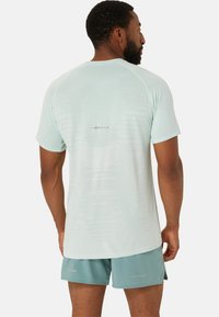 ASICS SEAMLESS SS - Sports T-shirts - light celadon birch